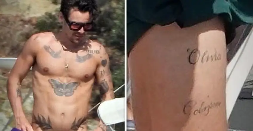 Harry Styles affiche un tatouage 'Olivia' sur la cuisse