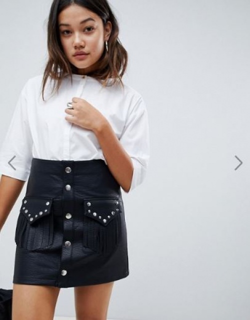 ASOS DESIGN - Mini-jupe en similicuir avec poche cloutée